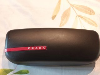 Occhiali Prada marrone scuro tartarugato/Grigio
