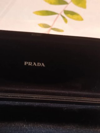 Occhiali Prada marrone scuro tartarugato/Grigio