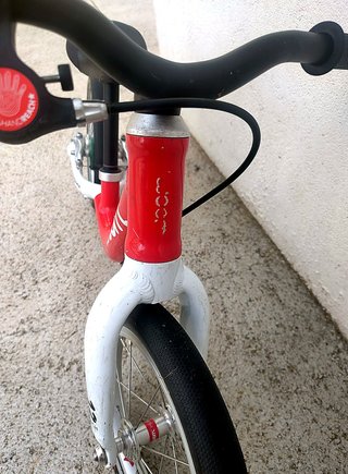 Bici sense pedals woom 1 12" vermella