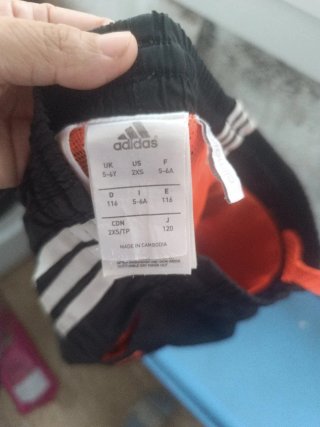 Bañador niño Adidas negro y naranja