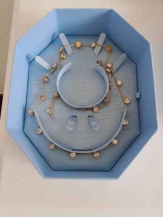 Gargantilla y pulsera Swarovski dorada