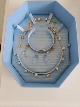 Gargantilla y pulsera Swarovski dorada