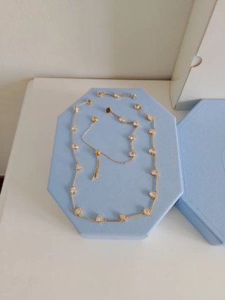 Gargantilla y pulsera Swarovski dorada