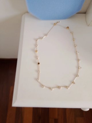 Gargantilla y pulsera Swarovski dorada