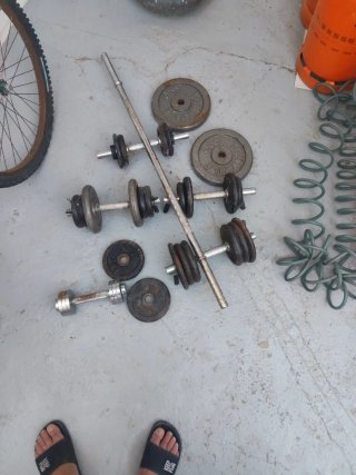 Manubri e barra da palestra