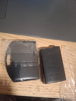 Batería y tapa PSP 1004