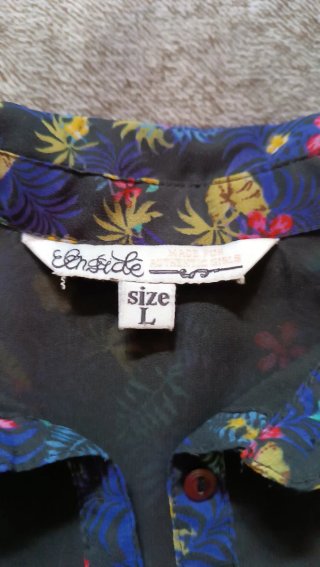 Blusa sin mangas vintage floral negra