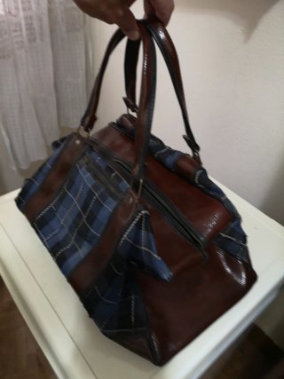 Bolso de viaje de cuero y tela