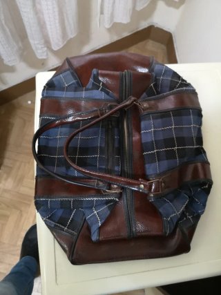 Bolso de viaje de cuero y tela