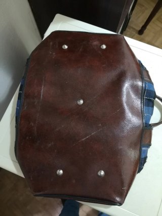 Bolso de viaje de cuero y tela
