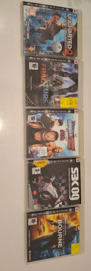 PlayStation 3 Slim + 2 Mandos Sony
