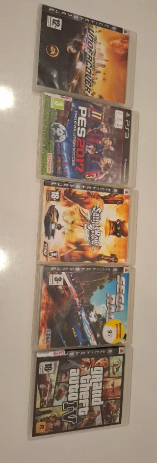 PlayStation 3 Slim + 2 Mandos Sony