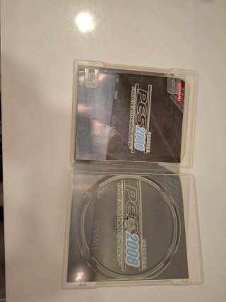 PlayStation 3 Slim + 2 Mandos Sony