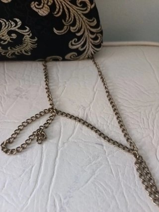 Bolso de fiesta negro y dorado