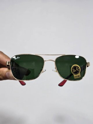 Gafas de sol Ray-Ban doradas y verdes