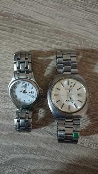 Coppia di Orologi Argento e Bianchi