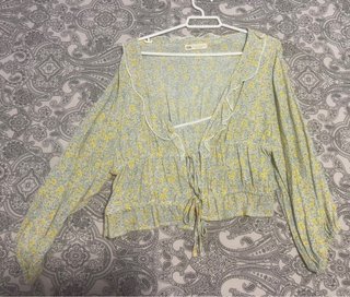Blusa floral manga larga
