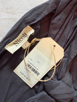 Top asimétrico nudo negro talla S