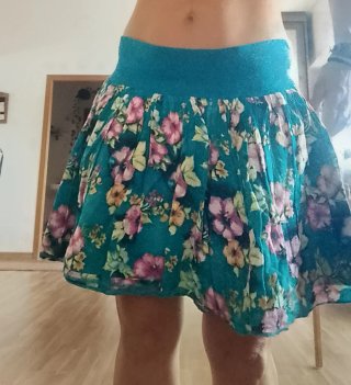 Falda corta H&M T.42