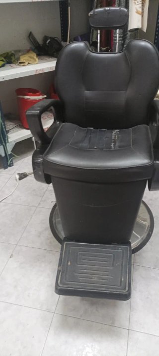 Sillón de peluquería negro