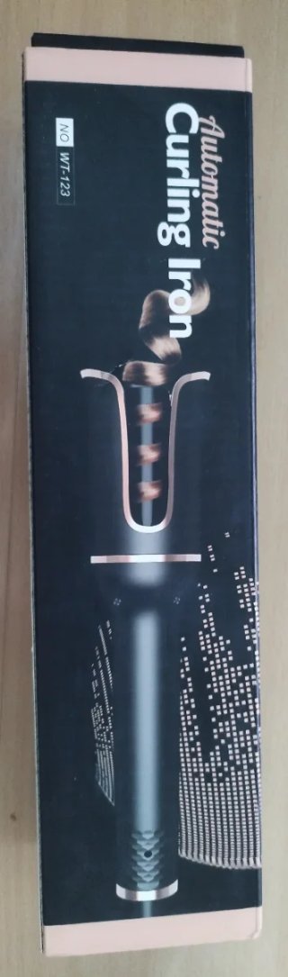 Rizador de pelo negro y dorado