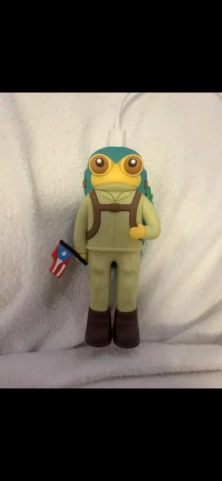 Cargador portátil figura rana con bandera PR