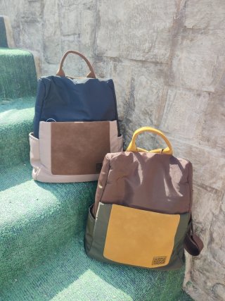 Mochilas Negras y Marrones