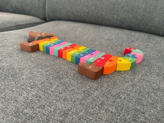 Puzzle in legno a forma di salsiccia con lettere Montessori