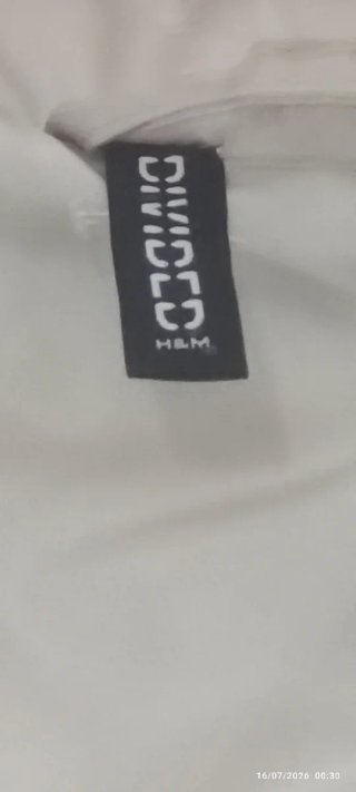 Chaleco H&M beige y negro