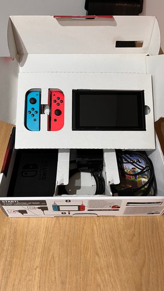 Nintendo Switch + Juegos