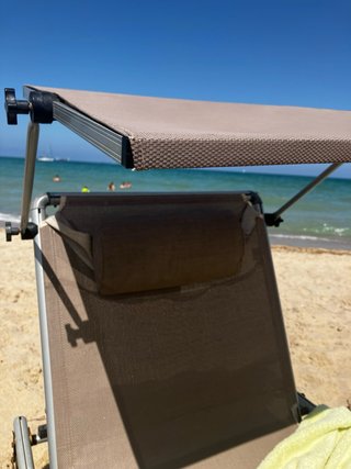 Tumbona plegable con sombrilla