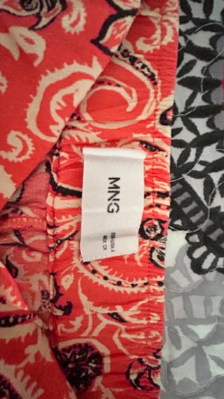 Pantalón fluido estampado coral