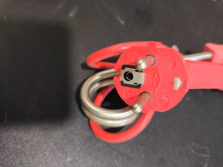 Resistencia eléctrica portátil roja.