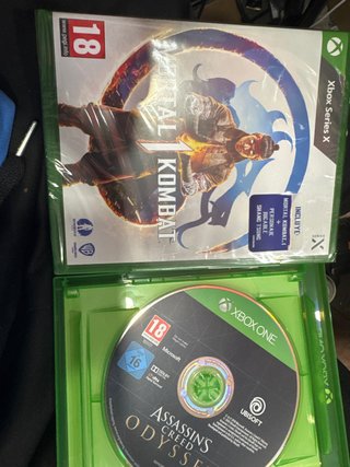Mortal Kombat 1 e Assassin's Creed Odyssey Xbox