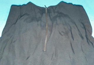 Blusa negra seda artificial media luna
