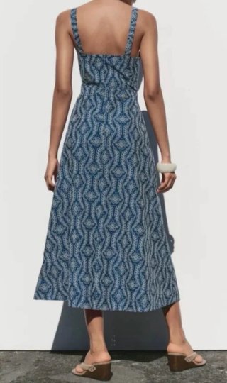 Vestido midi bordados perforados engomados. Zara S