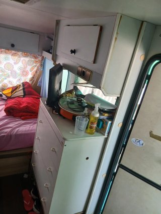 Caravana con ficha verde