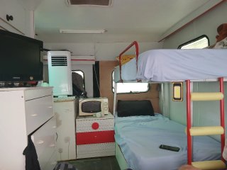 Caravana con ficha verde