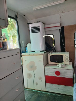 Caravana con ficha verde