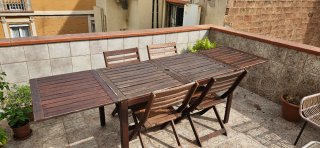 Mesa de exterior extensible con 4 sillas