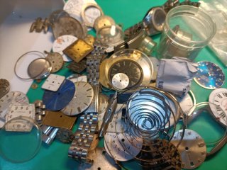 Lotto ricambi orologi oro e argento