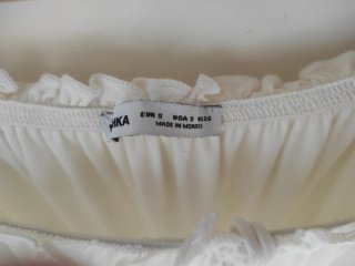 Vestido blanco escotado manga larga