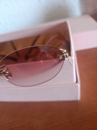 Gafas de sol Miu Miu rosas y marrones