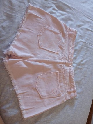 Vaqueros cortos rosa deshilachados