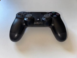 PS4 Slim 500GB Negra + Mando + Juegos