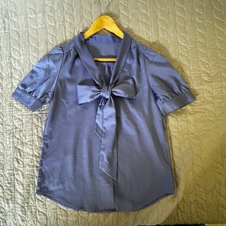 Blusa morada con lazo Talla única
