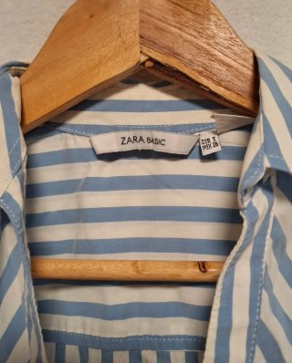 Blusa rayada azul y blanca