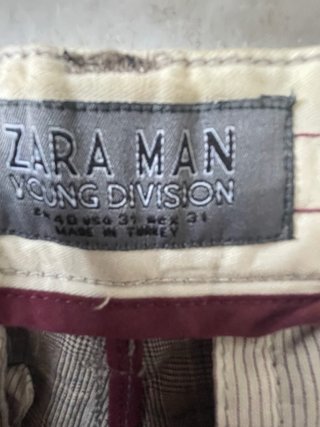Pantalones de cuadros beige y marrón
