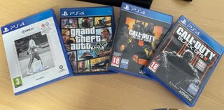 PS4 (PlayStation 4) 500GB Negra + 4 Juegos