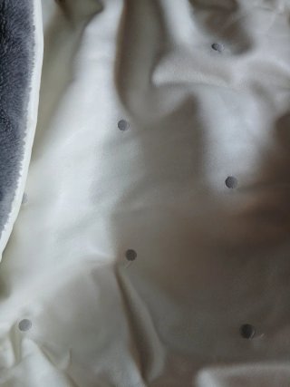 Saco Bugaboo polipiel gris topitos, con capota